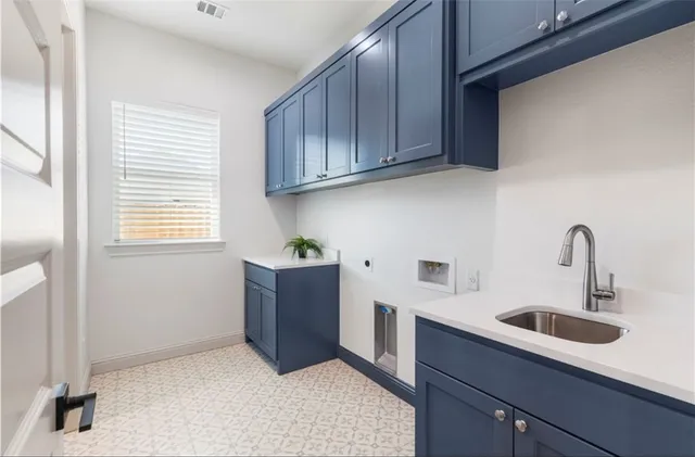 a bathroom with a toilet and a sink