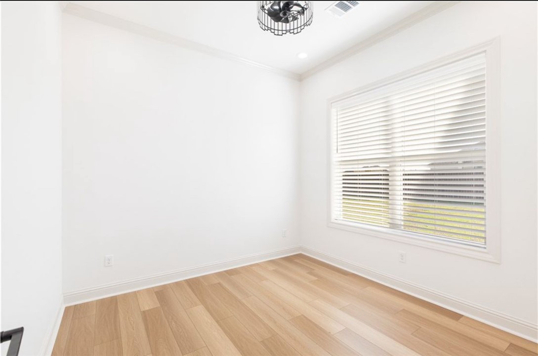 5102 Greenstone Way Bryan, TX 77802 - Photo 21 of 29 a view of an empty room with a window