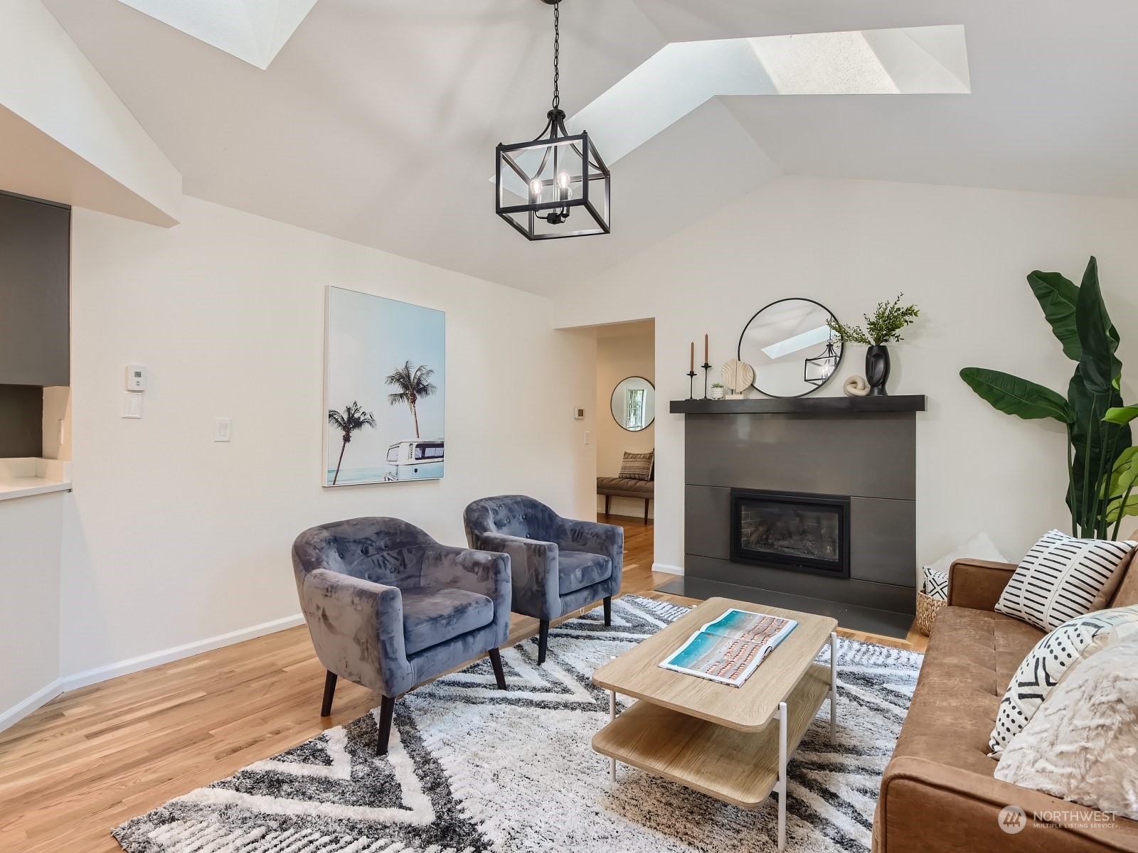 24207 15th Place Southeast Bothell, WA 98021 - Photo 11 of 27 a living room with furniture and a fireplace