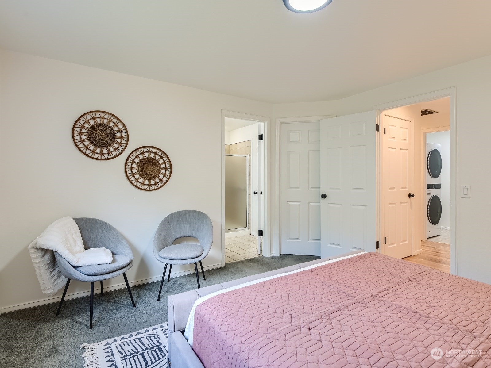 24207 15th Place Southeast Bothell, WA 98021 - Photo 13 of 27 a bedroom with a bed and a chair