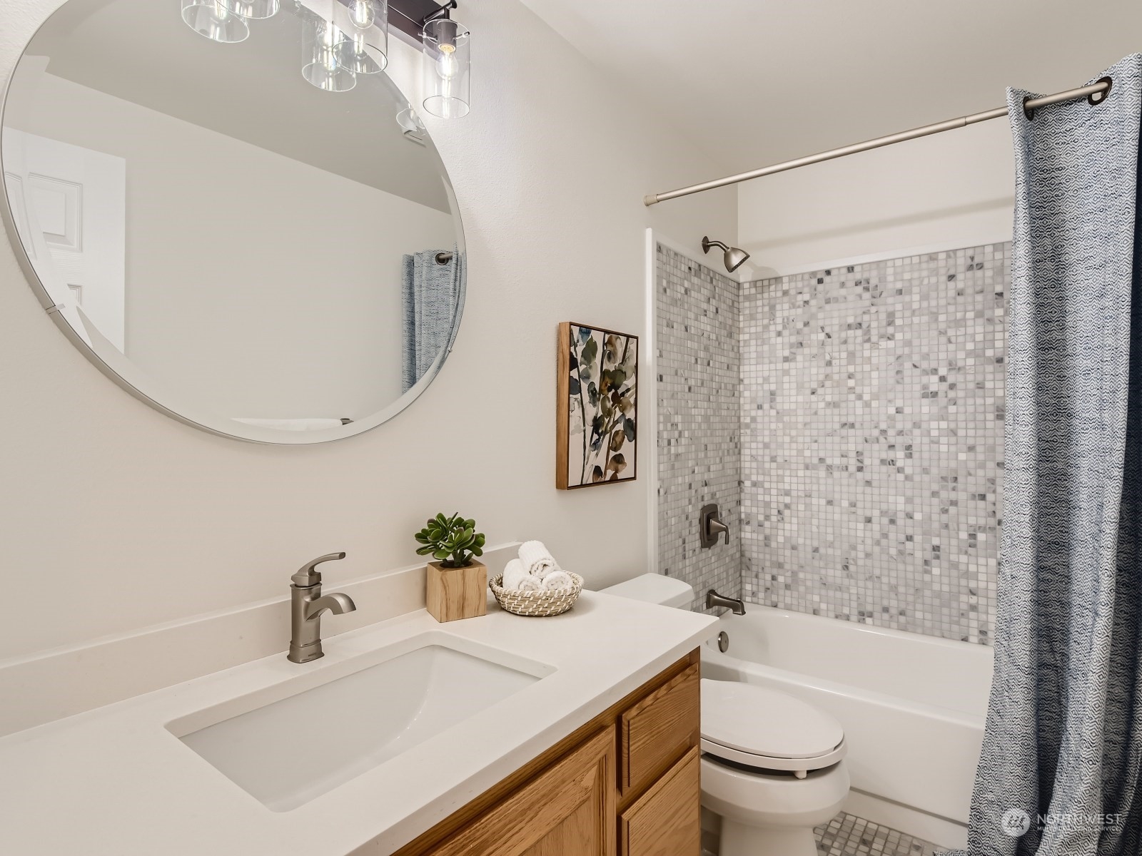 24207 15th Place Southeast Bothell, WA 98021 - Photo 18 of 27 a bathroom with a sink toilet and shower