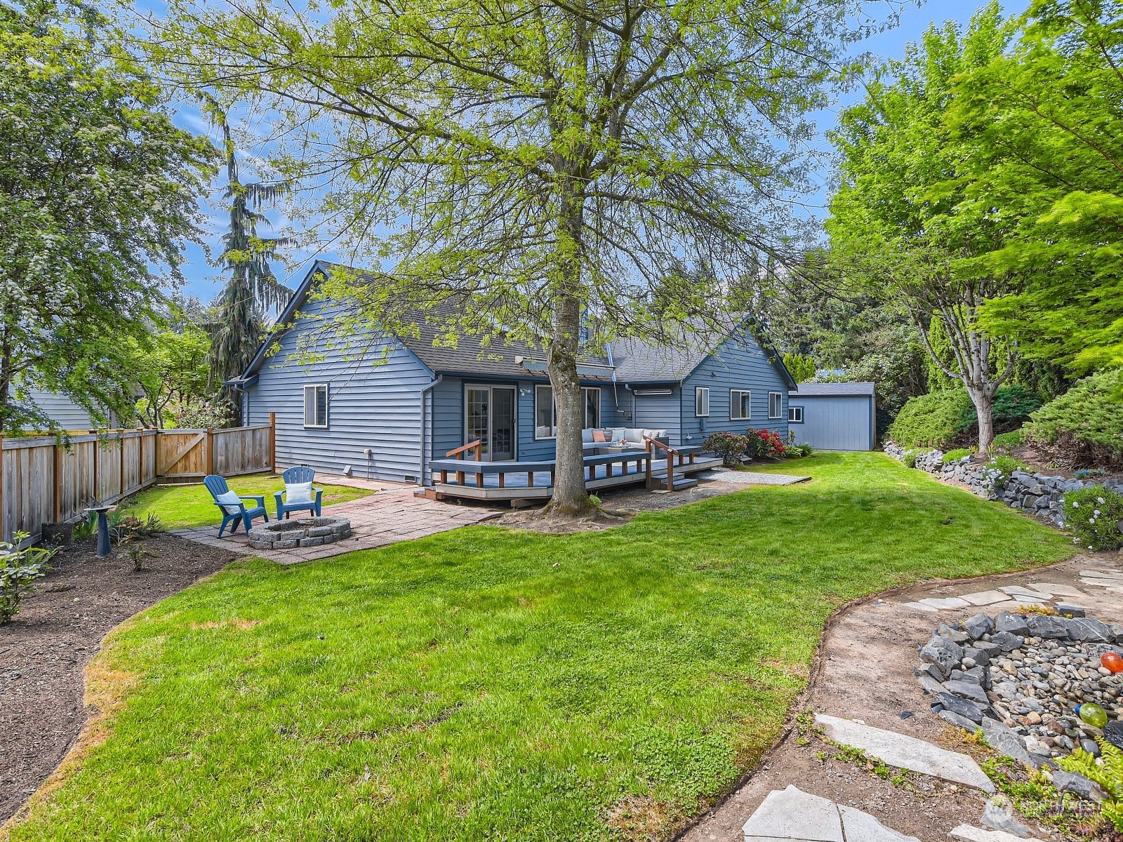 24207 15th Place Southeast Bothell, WA 98021 - Photo 20 of 27 a view of a house with backyard and sitting area