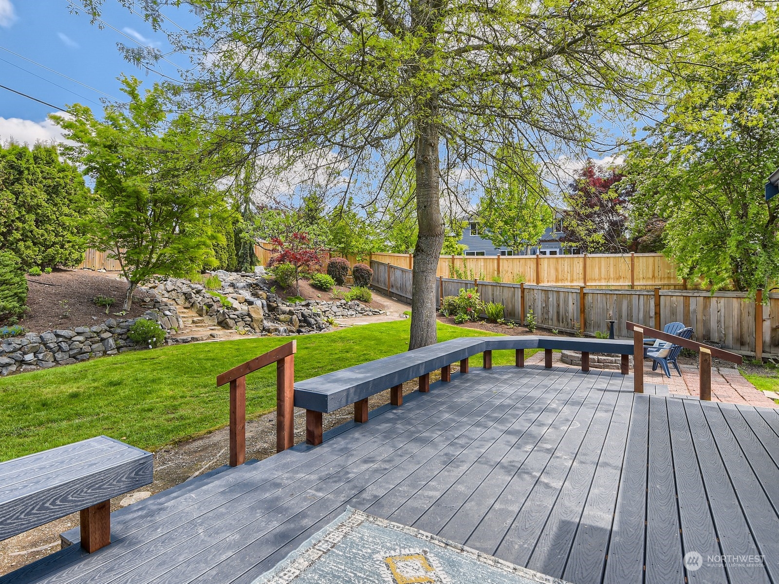 24207 15th Place Southeast Bothell, WA 98021 - Photo 22 of 27 a view of outdoor sitting area with chairs and wooden fence