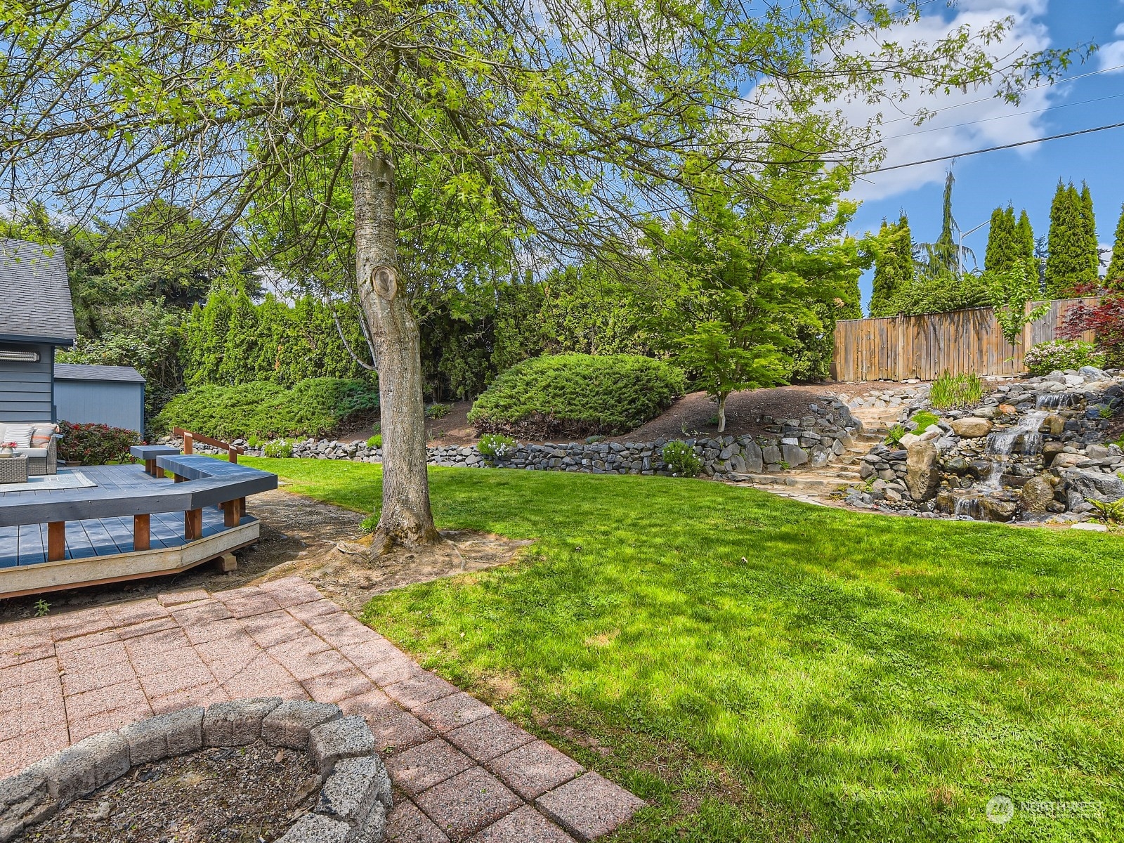 24207 15th Place Southeast Bothell, WA 98021 - Photo 23 of 27 a view of a backyard with sitting area
