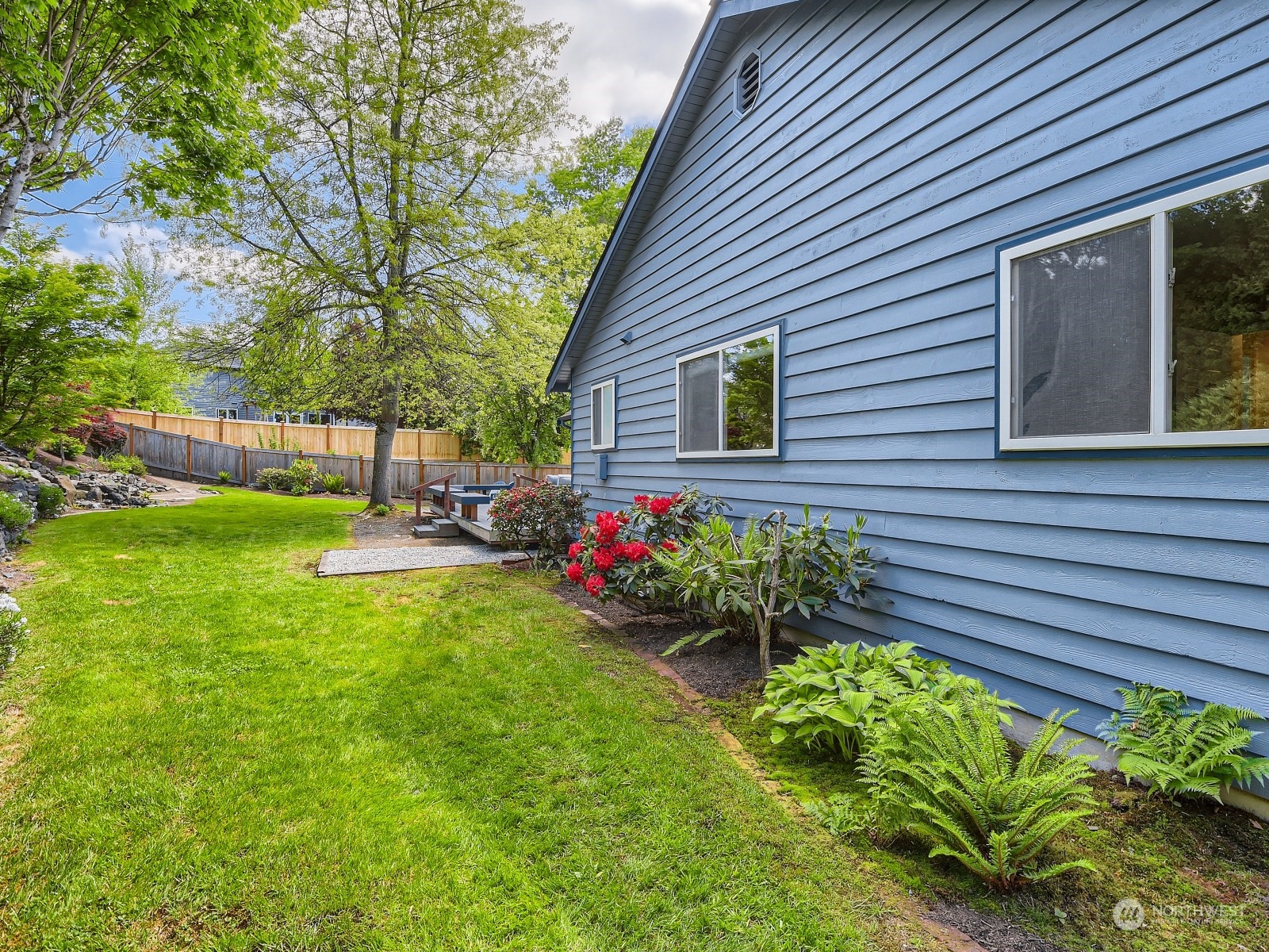 24207 15th Place Southeast Bothell, WA 98021 - Photo 25 of 27 a view of a backyard with a garden