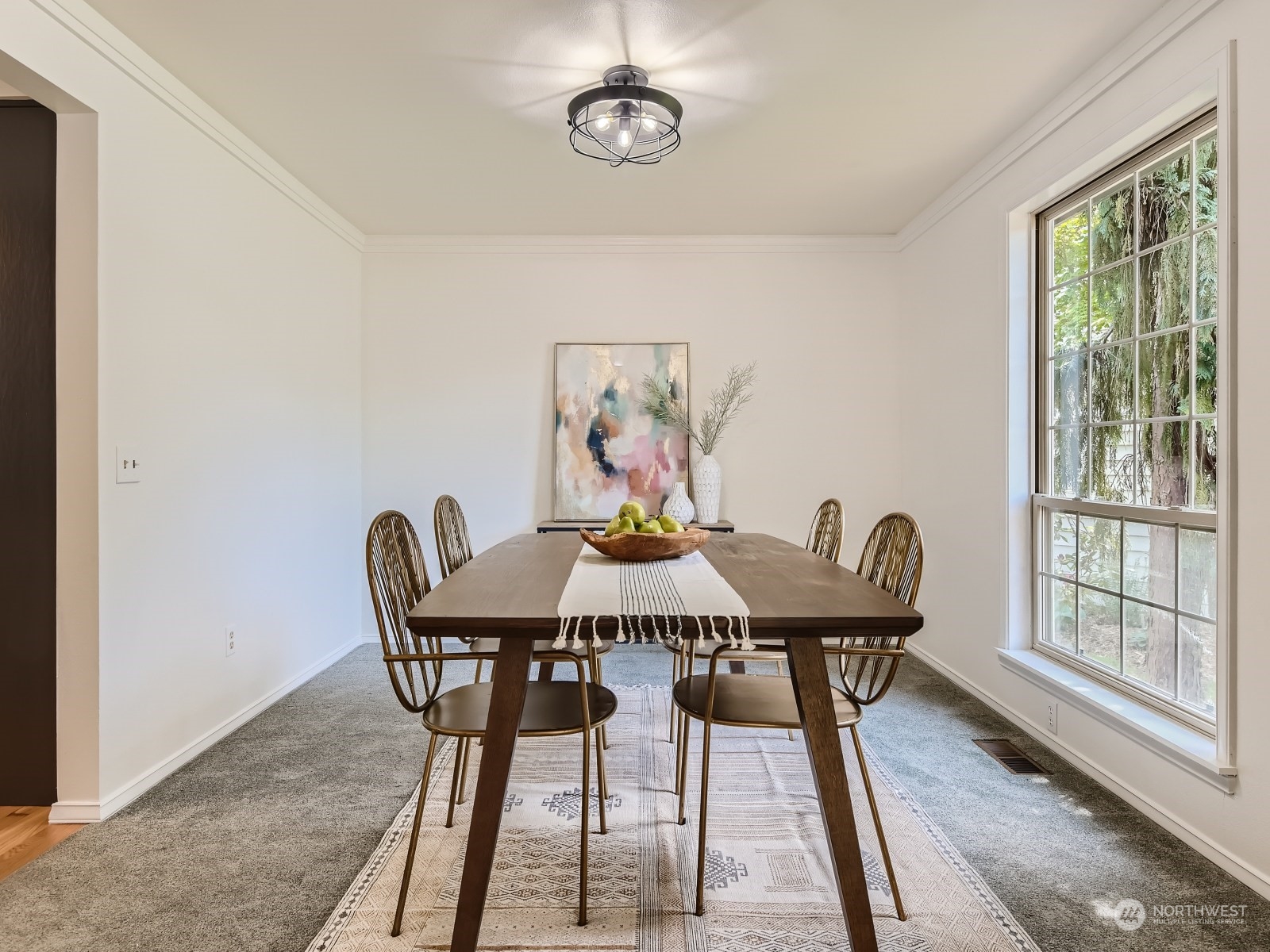 24207 15th Place Southeast Bothell, WA 98021 - Photo 4 of 27 a view of a dining room with furniture wooden floor and a carpet