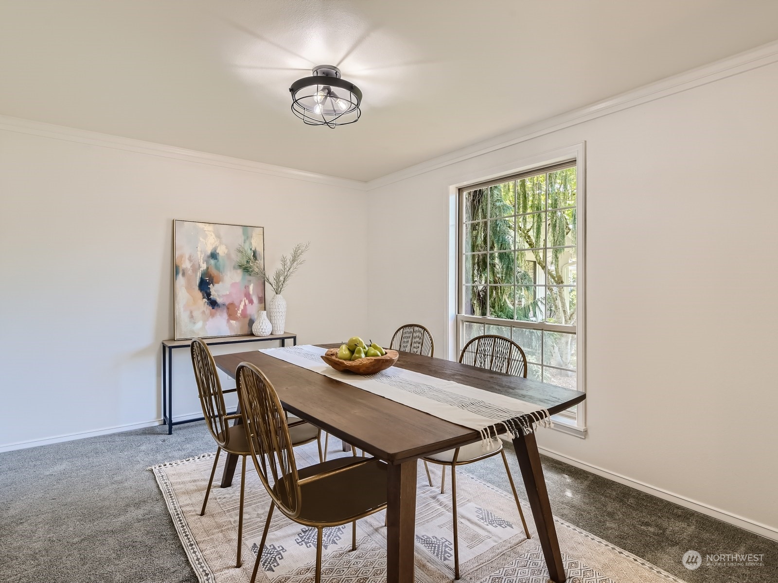 24207 15th Place Southeast Bothell, WA 98021 - Photo 5 of 27 a view of a dining room with furniture window and wooden floor