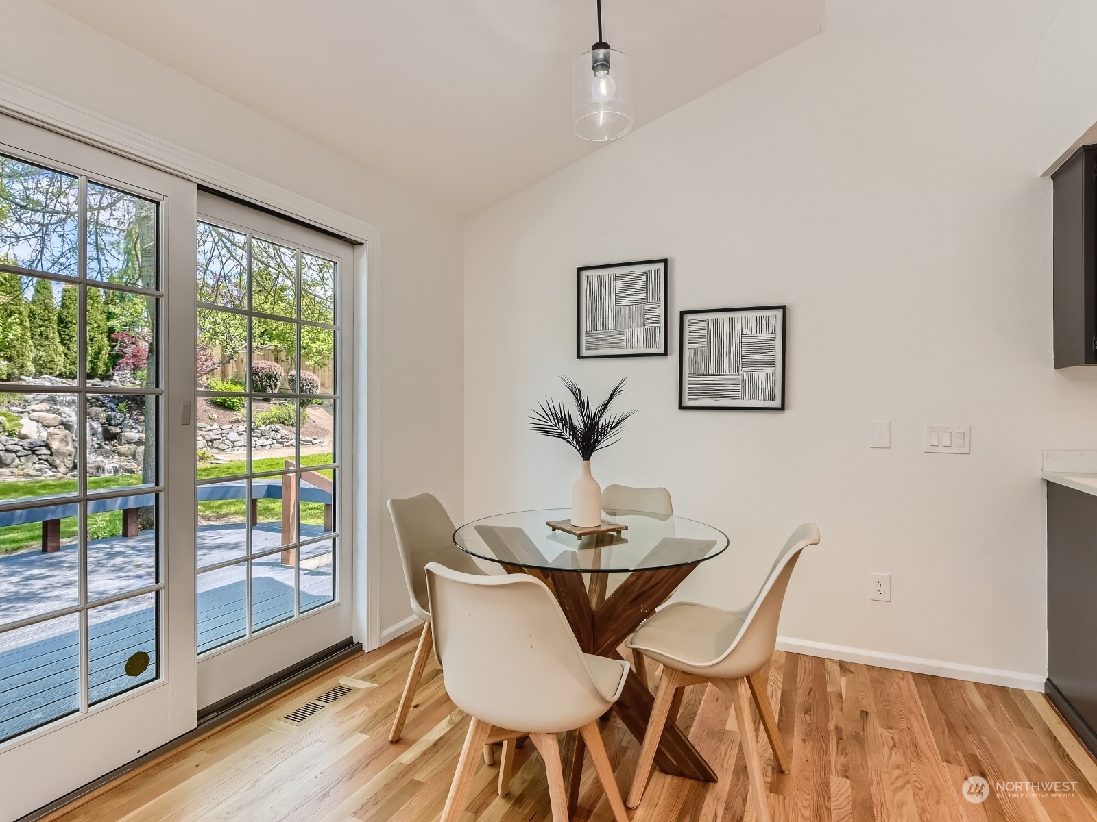 24207 15th Place Southeast Bothell, WA 98021 - Photo 9 of 27 a view of a dining room with furniture window and wooden floor