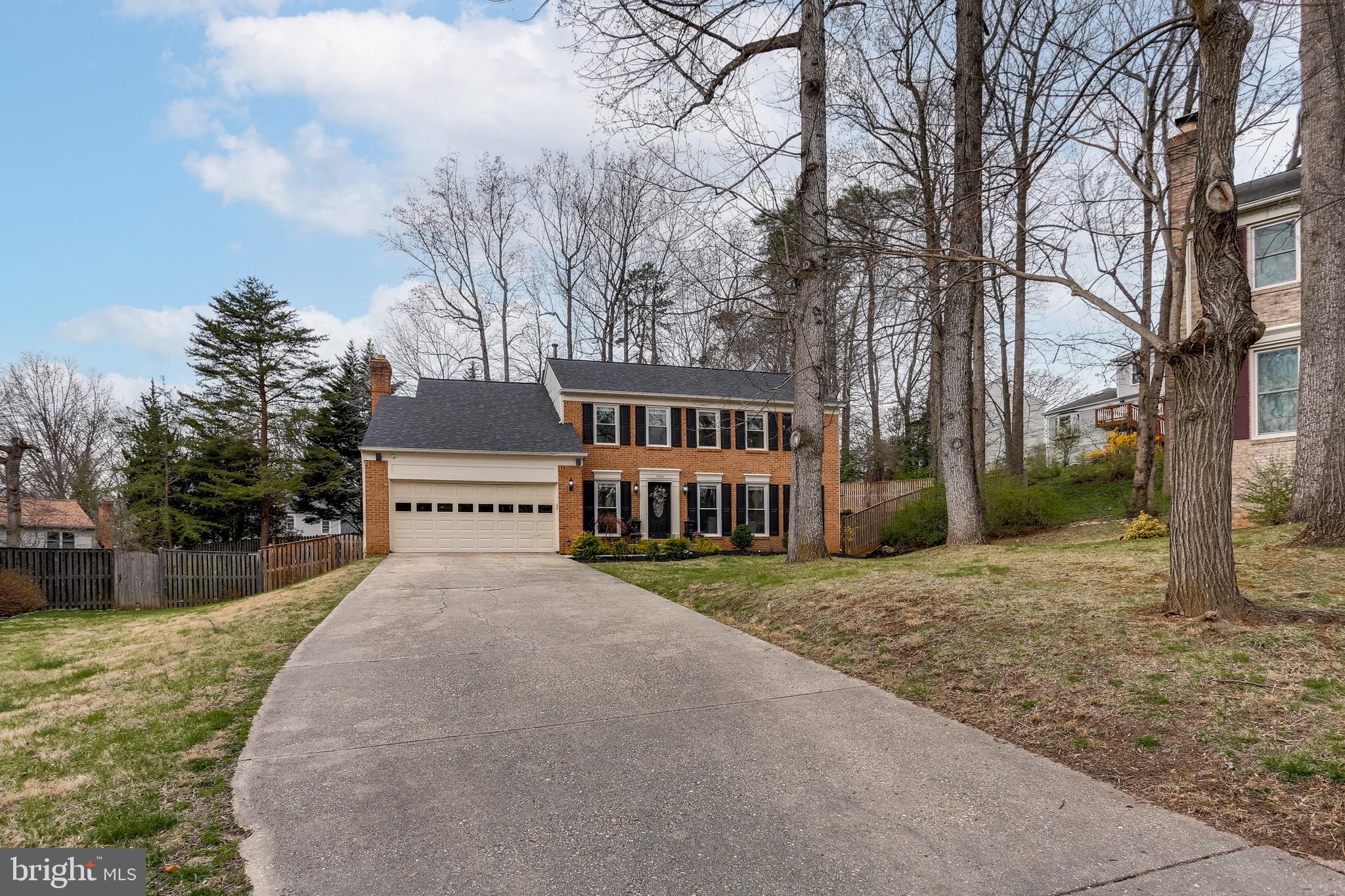 Long driveway with two car garage
