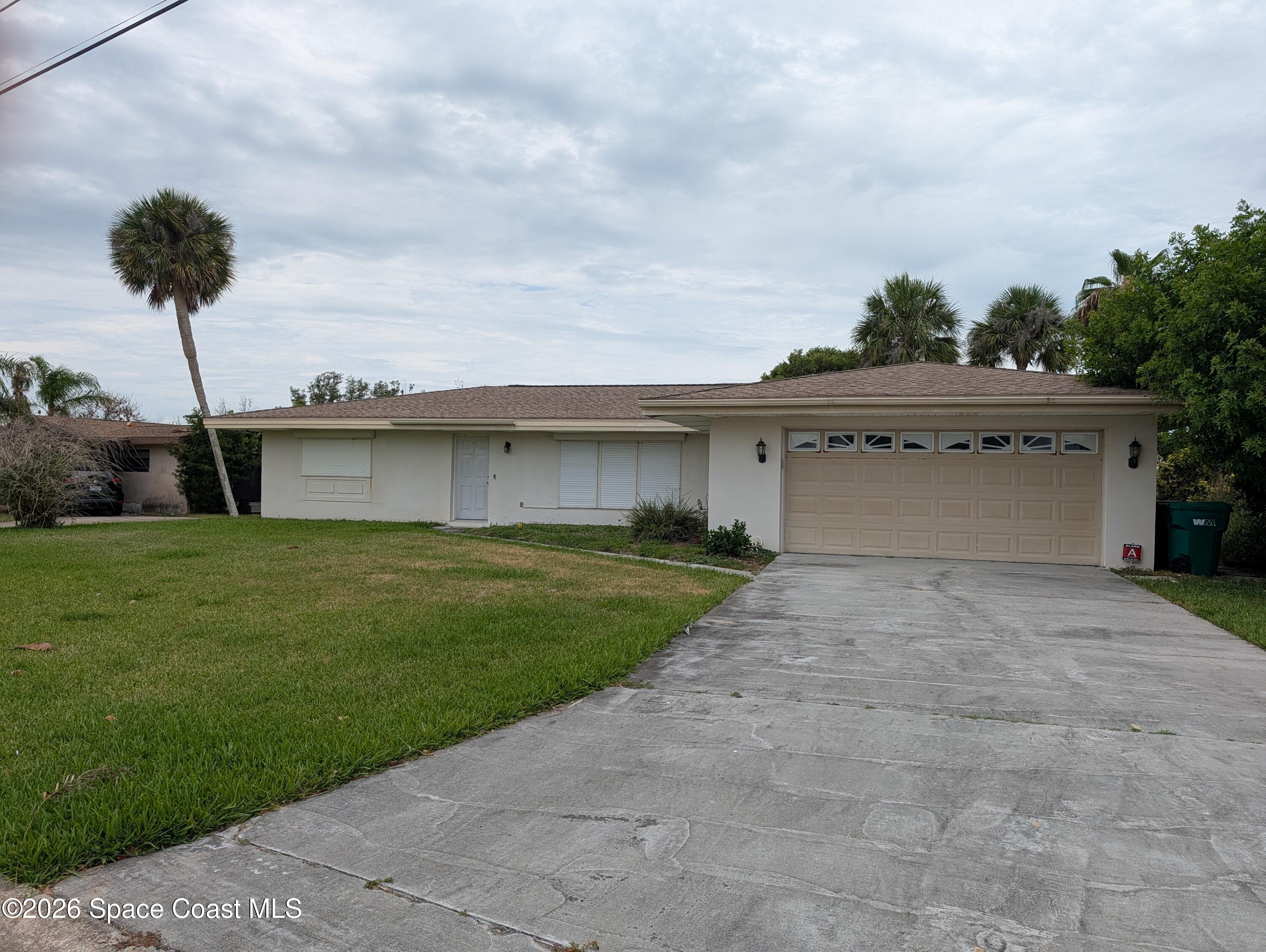 597 Capri Road Cocoa Beach, FL 32931 - Photo 1 of 33 PXL_20260609_170226758