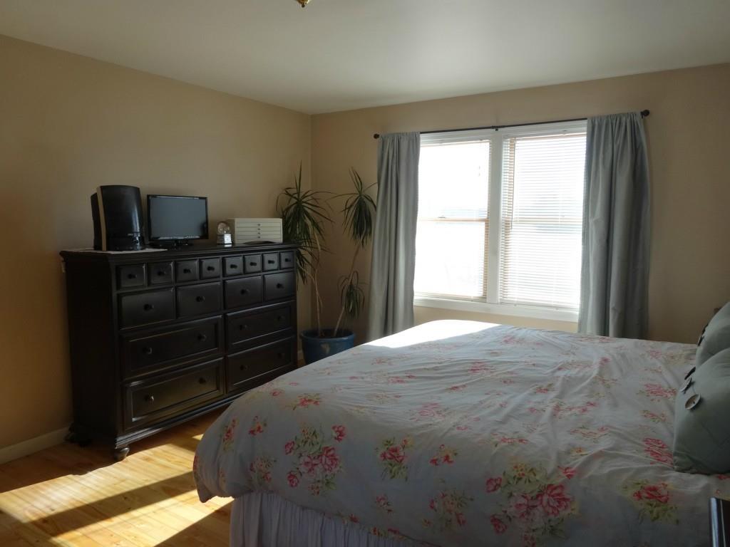 270 Coles Corner Road Winterport, ME 04496 - Photo 22 of 35 A spacious room with hardwood and...