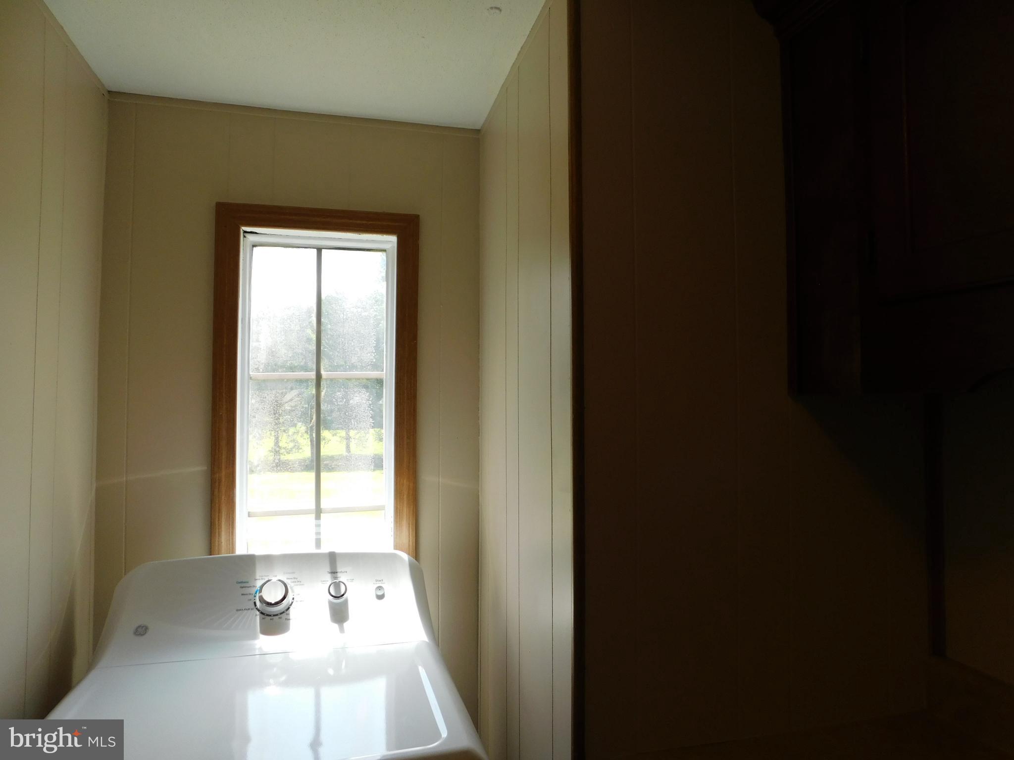 192 AA Rogers Road Augusta, WV 26704 - Photo 15 of 34 a view of an empty room and window