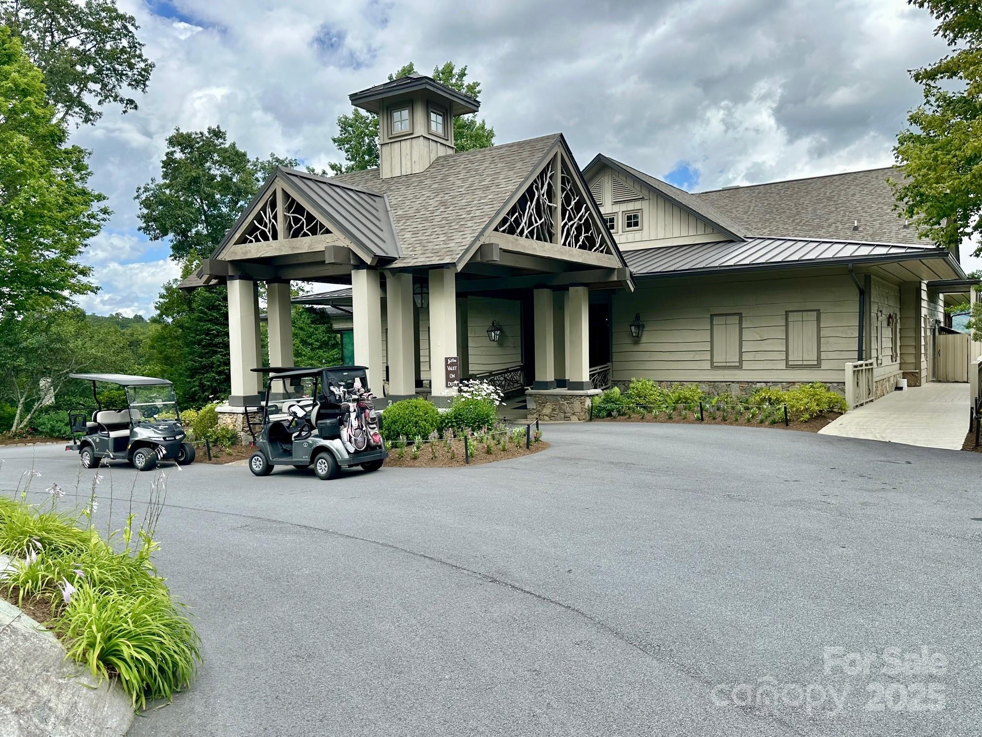 56 First Tee Trail Cashiers, NC 28717 - Photo 28 of 37 a view of a house with sitting area and furniture