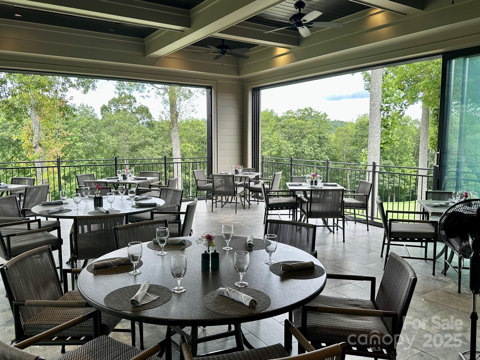56 First Tee Trail Cashiers, NC 28717 - Photo 29 of 37 a view of a dining room with furniture window and outside view