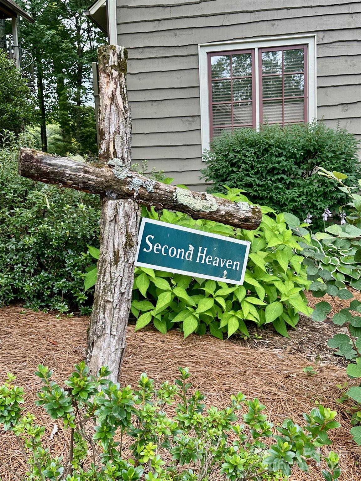 56 First Tee Trail Cashiers, NC 28717 - Photo 3 of 37 a view of a sign board with yard