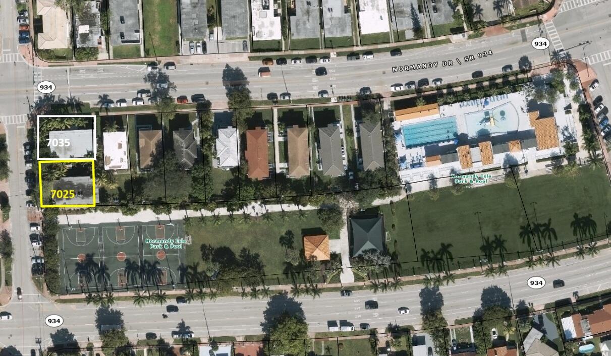 7035 Rue Granville Miami Beach, FL 33141 - Photo 12 of 12 a aerial view of a building with a lake view