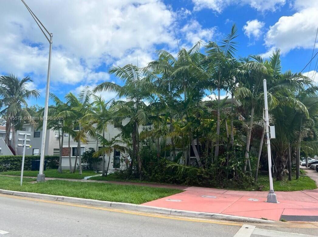 7035 Rue Granville Miami Beach, FL 33141 - Photo 4 of 12 a view of a yard in front of a house