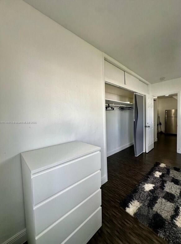 7035 Rue Granville Miami Beach, FL 33141 - Photo 10 of 12 a bathroom with a bathtub and a shower