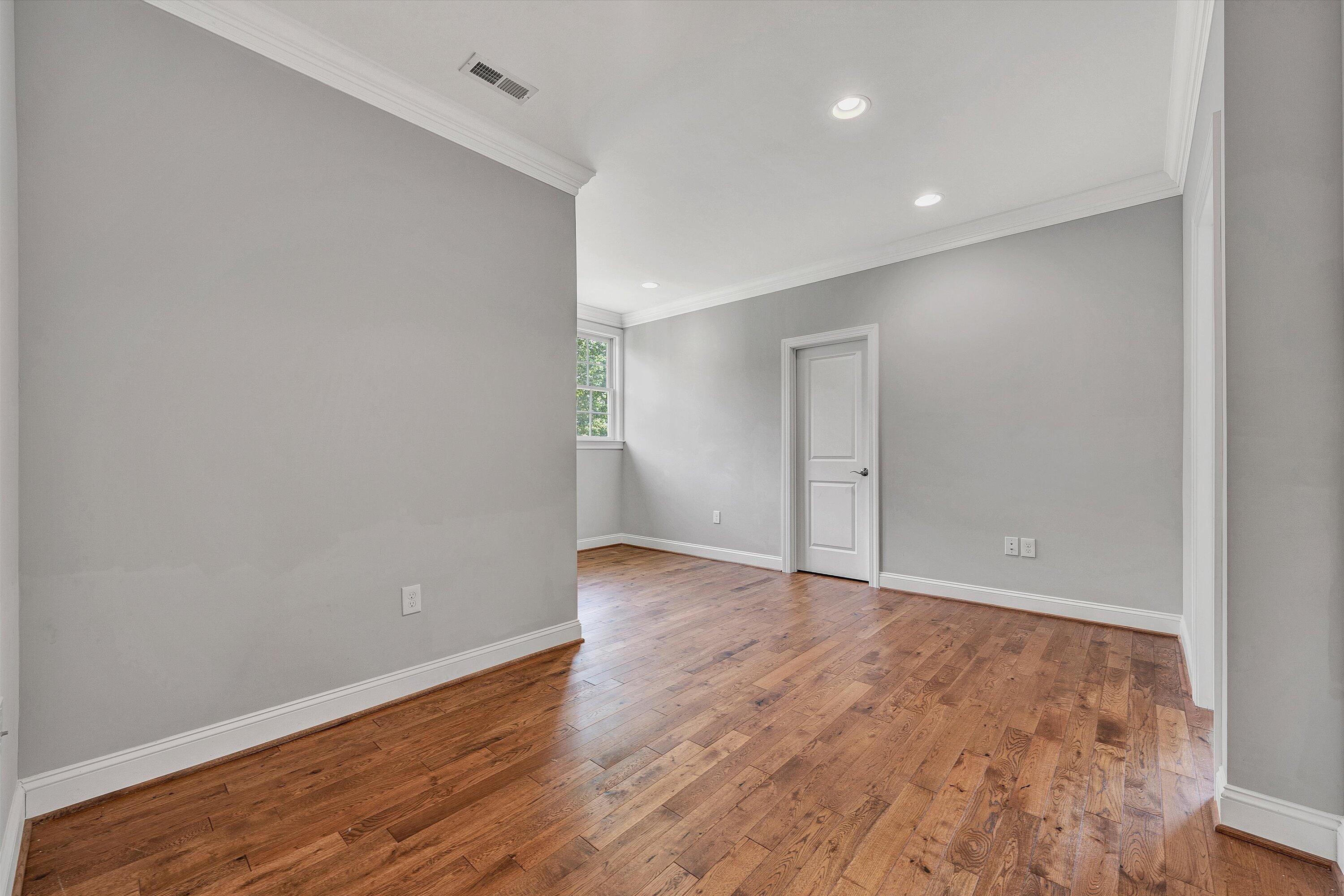 6981 Fairway Ridge Road Salem, VA 24153 - Photo 37 of 53 a view of an empty room with wooden floor and closet