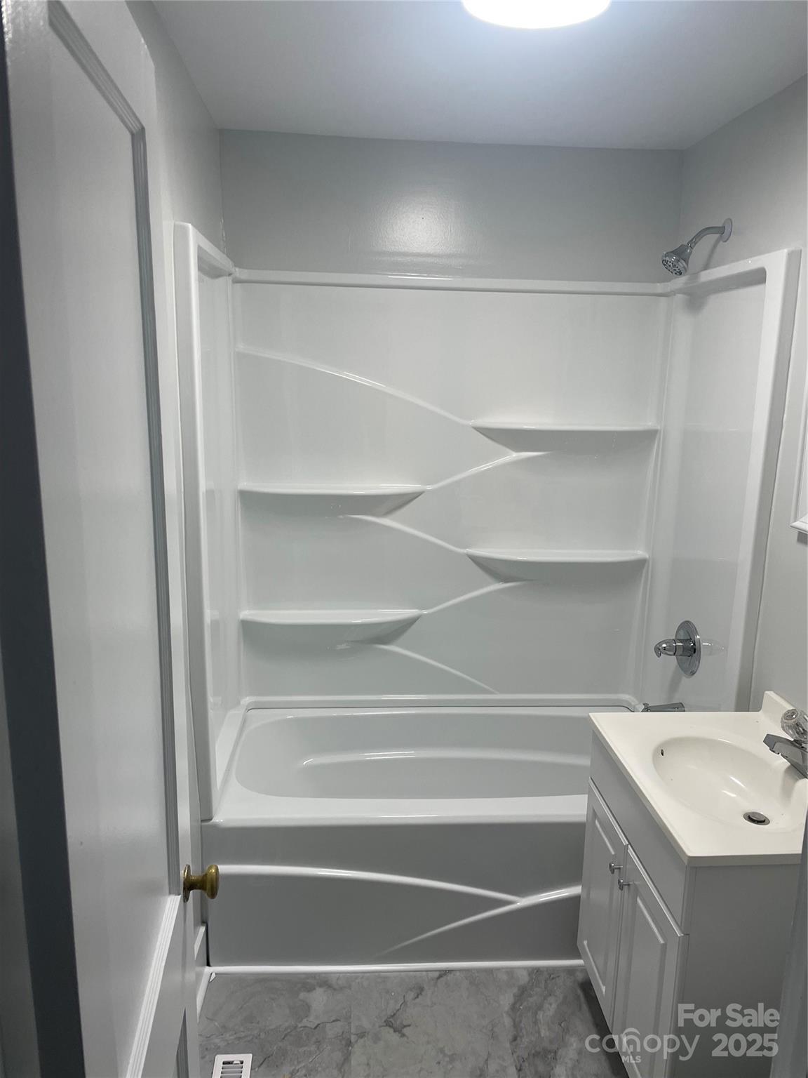 1050 Julian Road Salisbury, NC 28146 - Photo 8 of 8 a view of walk in closet with empty racks