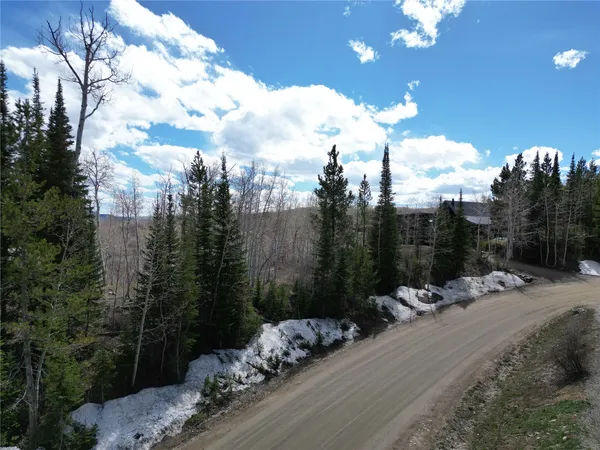 a view of a backyard of a house