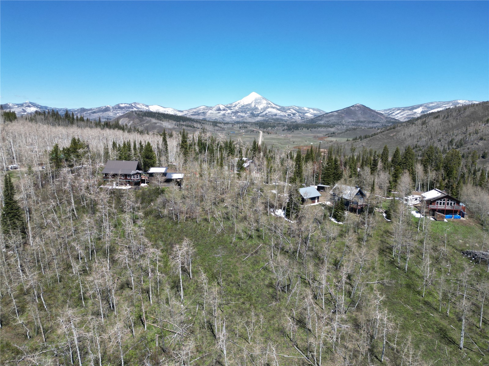 57960 Longfellow Way Clark, CO 80428 - Photo 15 of 17 a view of a town with mountains in the background