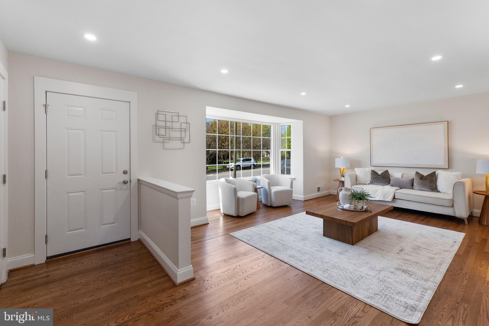 3003 Farm Road Alexandria, VA 22302 - Photo 3 of 49 a living room with furniture and large windows