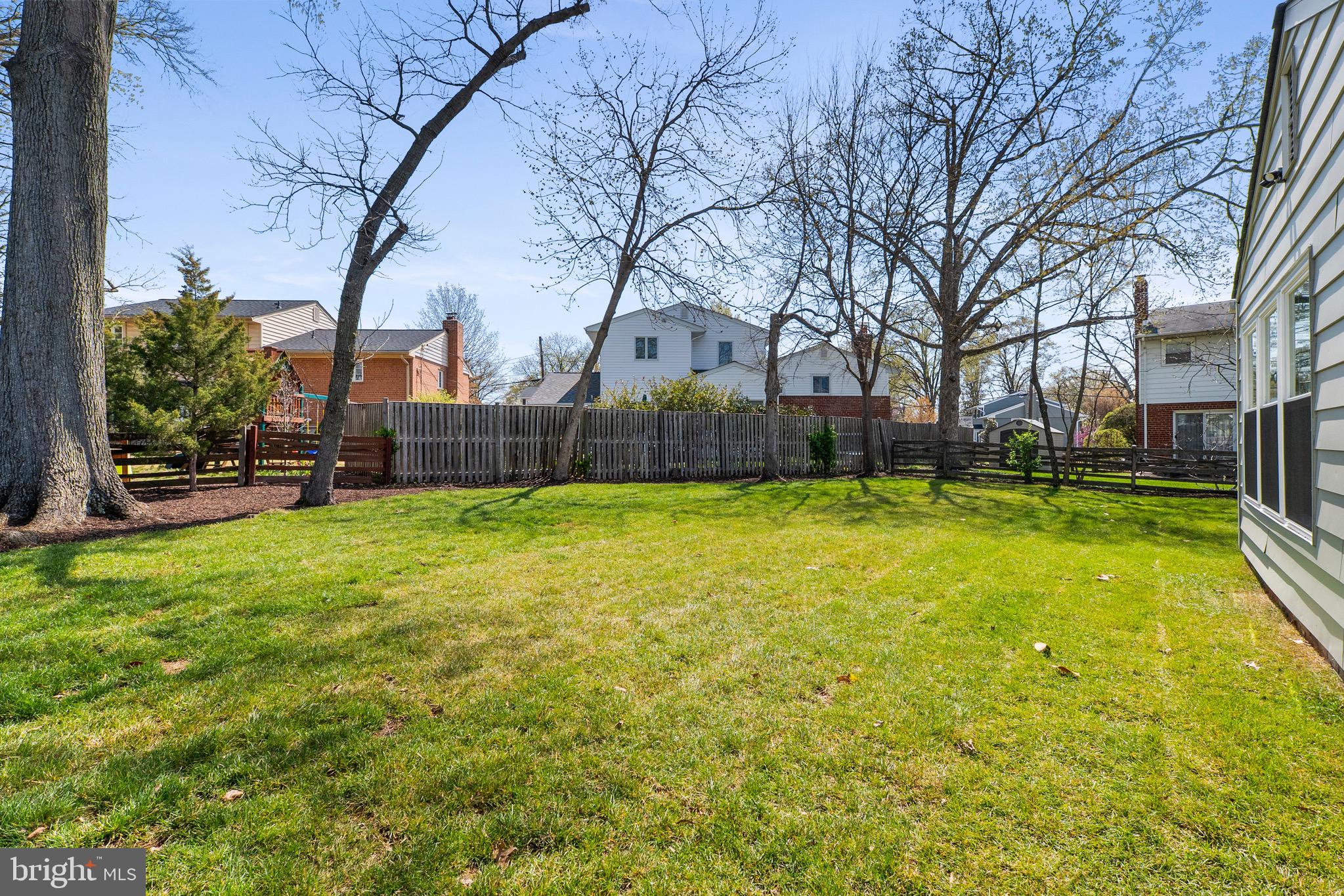 3003 Farm Road Alexandria, VA 22302 - Photo 43 of 49 a view of a yard with a house in the background