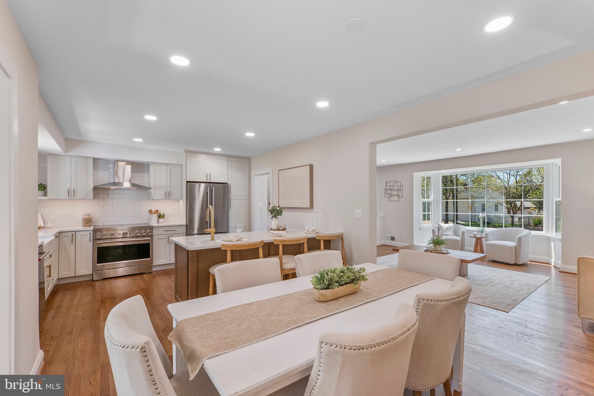 3003 Farm Road Alexandria, VA 22302 - Photo 9 of 49 a large kitchen with a table and chairs