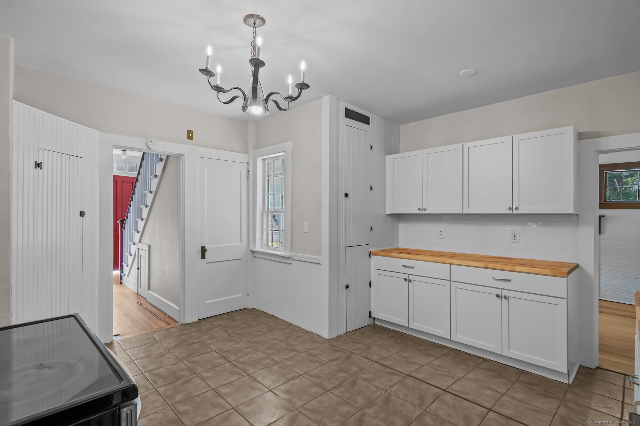 10 North Road Windham, CT 06280 - Photo 14 of 40 a view of a kitchen with an oven and cabinets