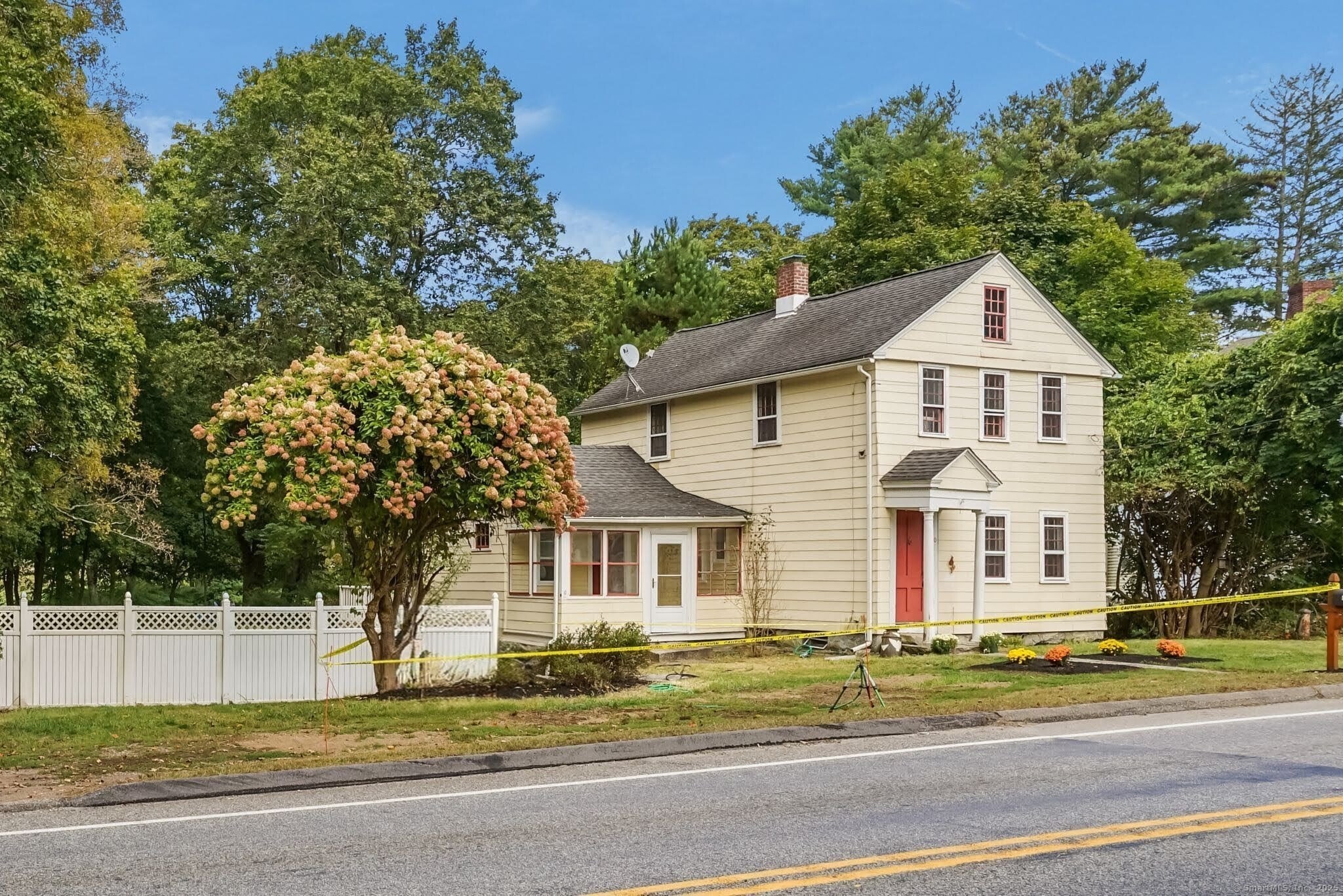 10 North Road Windham, CT 06280 - Photo 2 of 40 a front view of a house with a garden