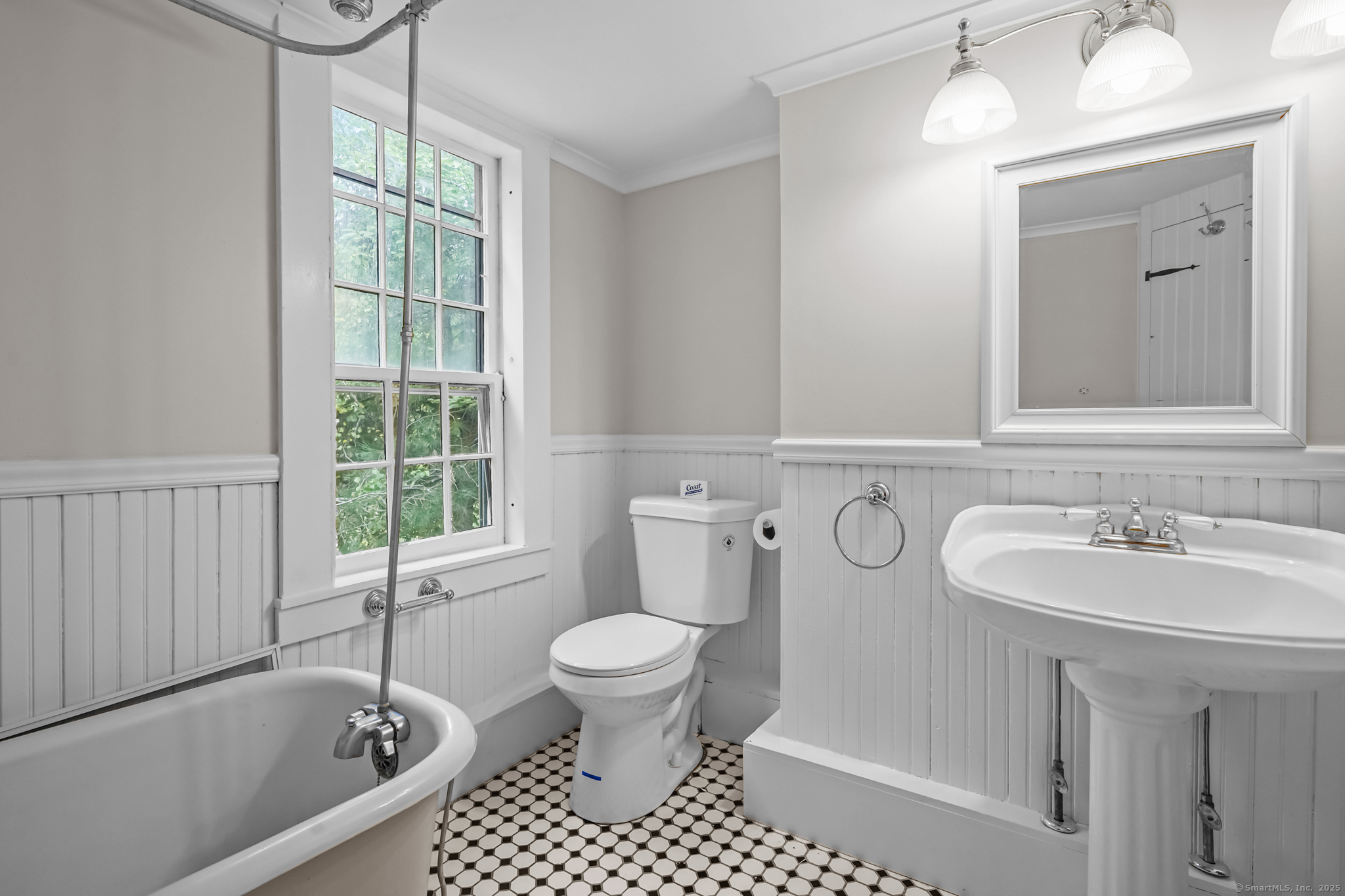 10 North Road Windham, CT 06280 - Photo 23 of 40 a bathroom with a sink a toilet and a bathtub