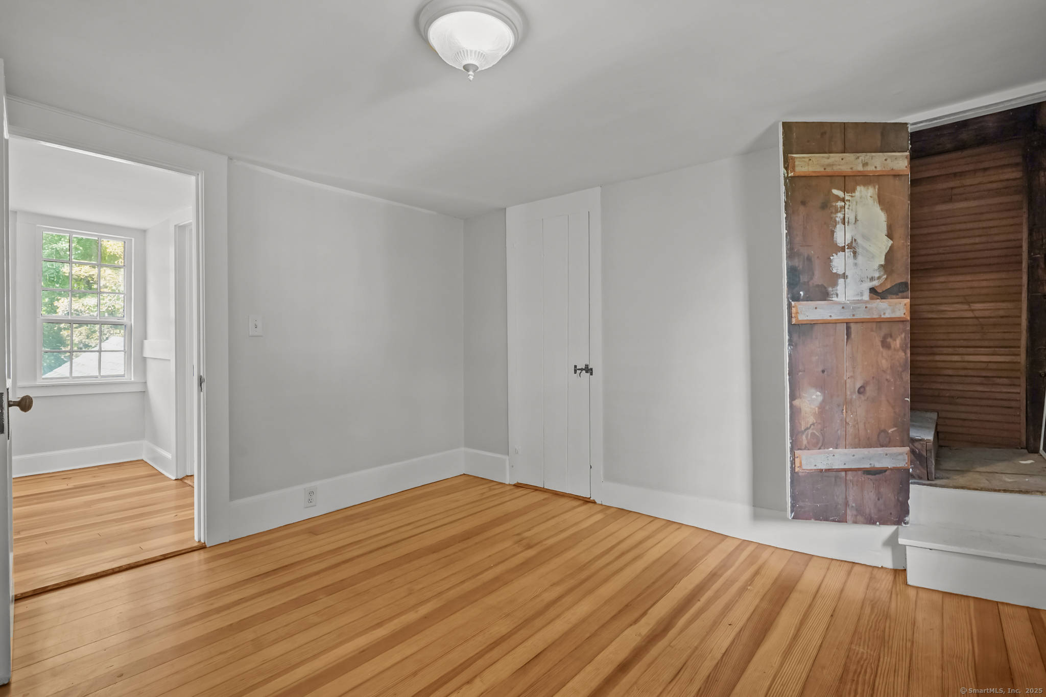 10 North Road Windham, CT 06280 - Photo 25 of 40 a view of empty room with wooden floor