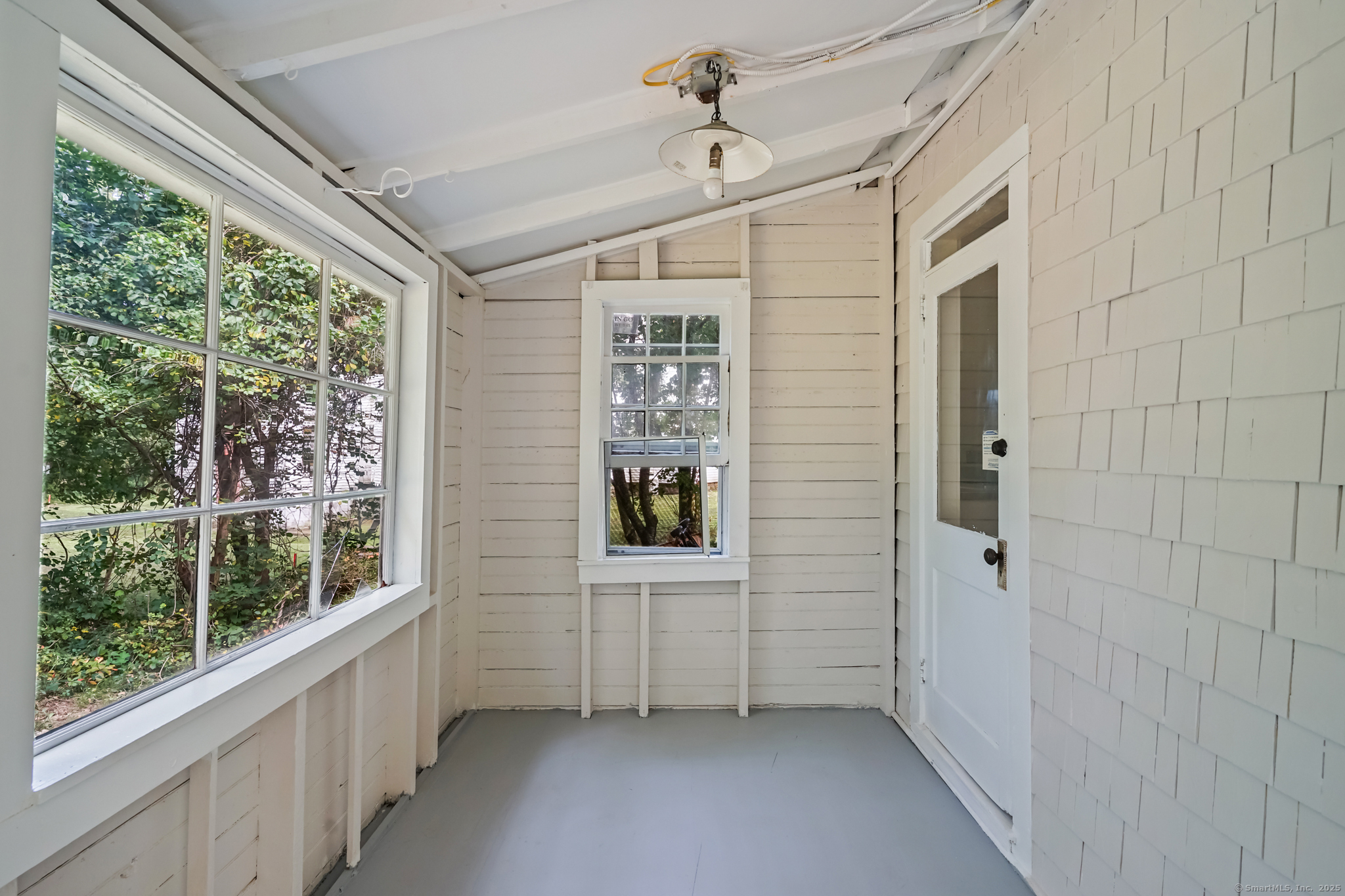 10 North Road Windham, CT 06280 - Photo 35 of 40 a view of an empty room with a window