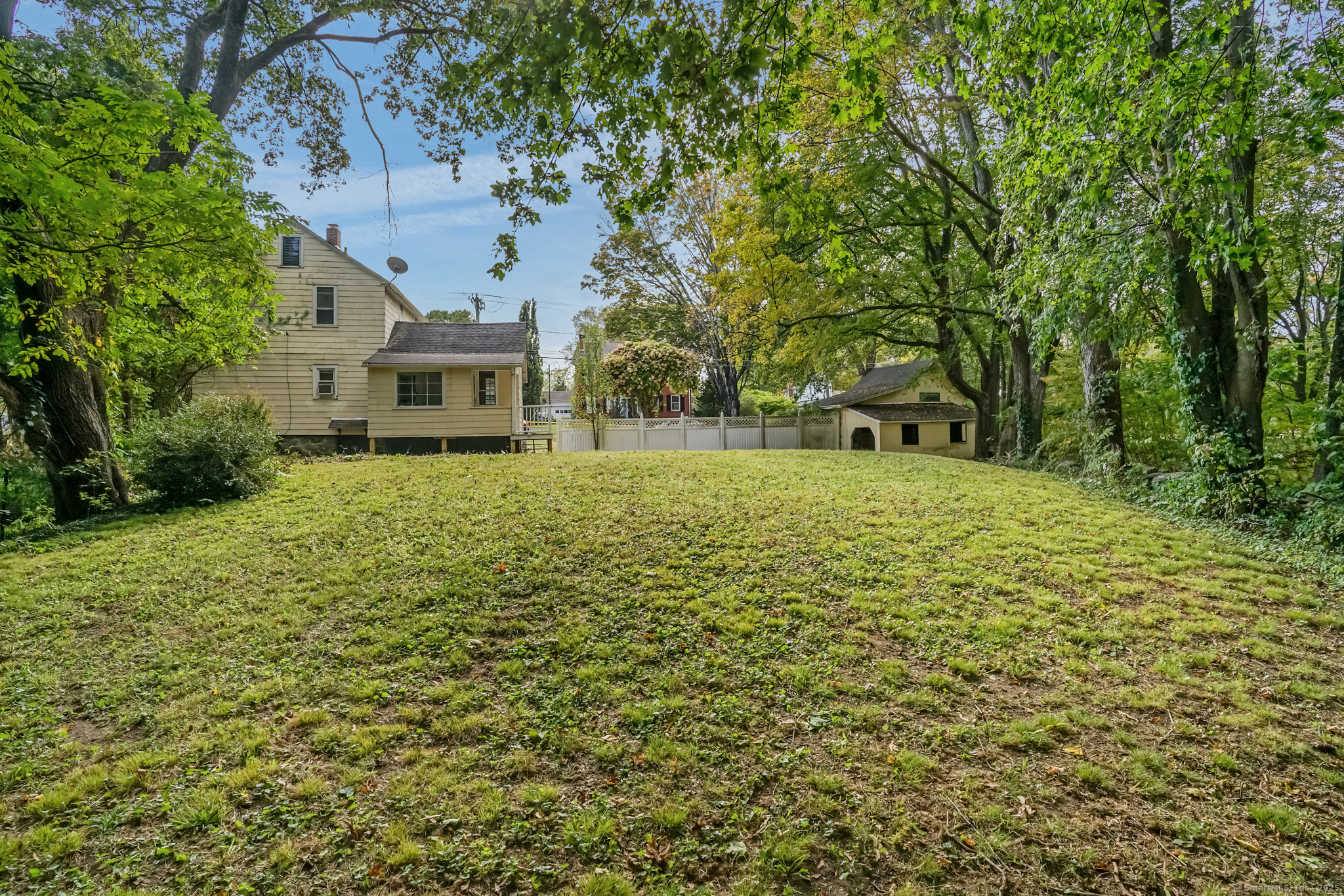 10 North Road Windham, CT 06280 - Photo 37 of 40 a view of a house with a yard