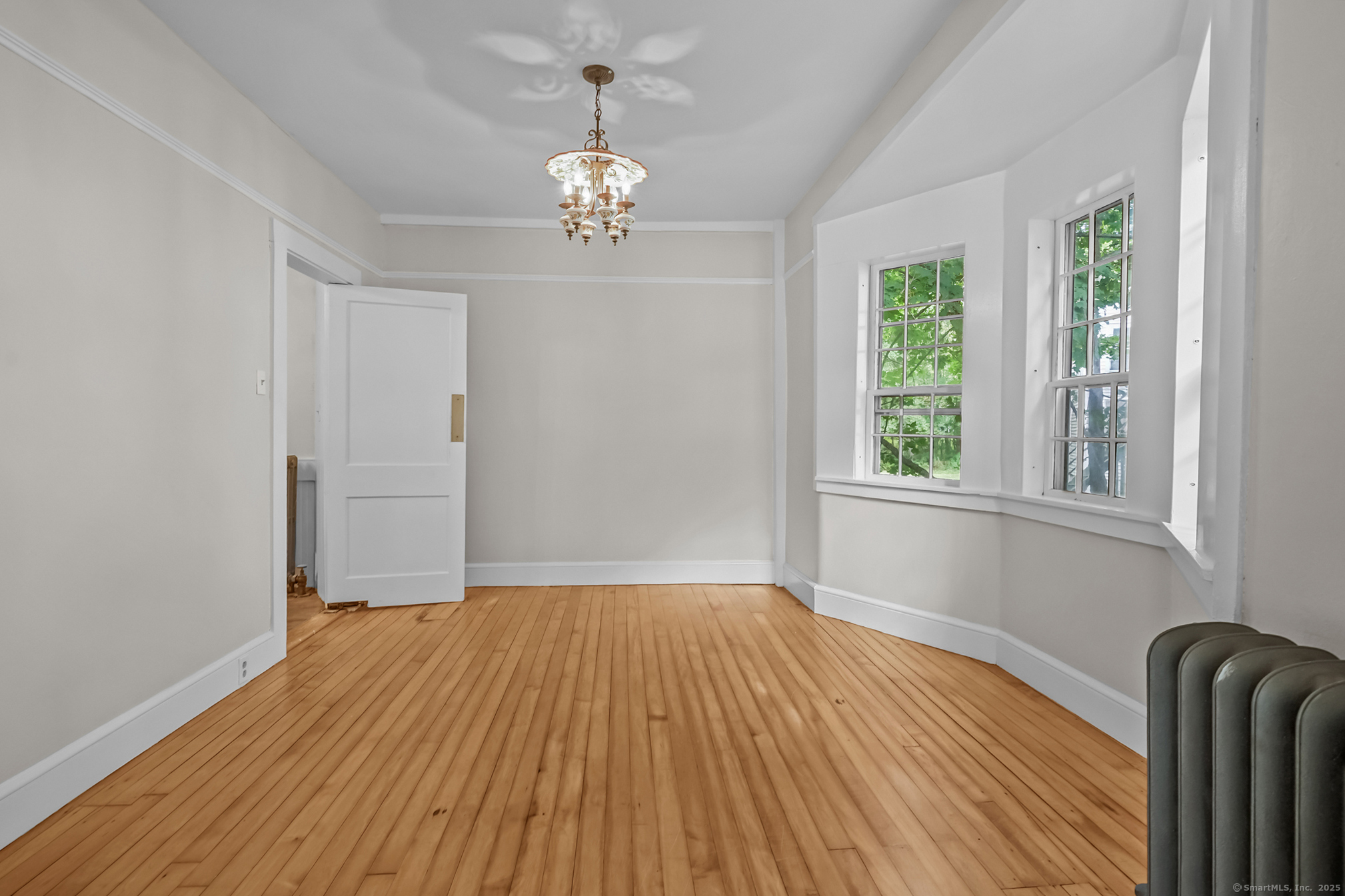 10 North Road Windham, CT 06280 - Photo 10 of 40 a view of livingroom with hardwood floor and window