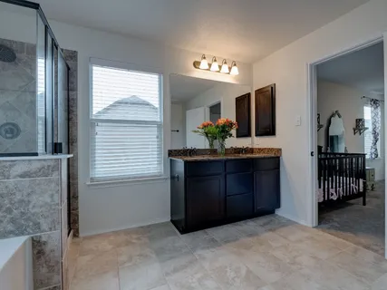 a room with a dresser and a mirror