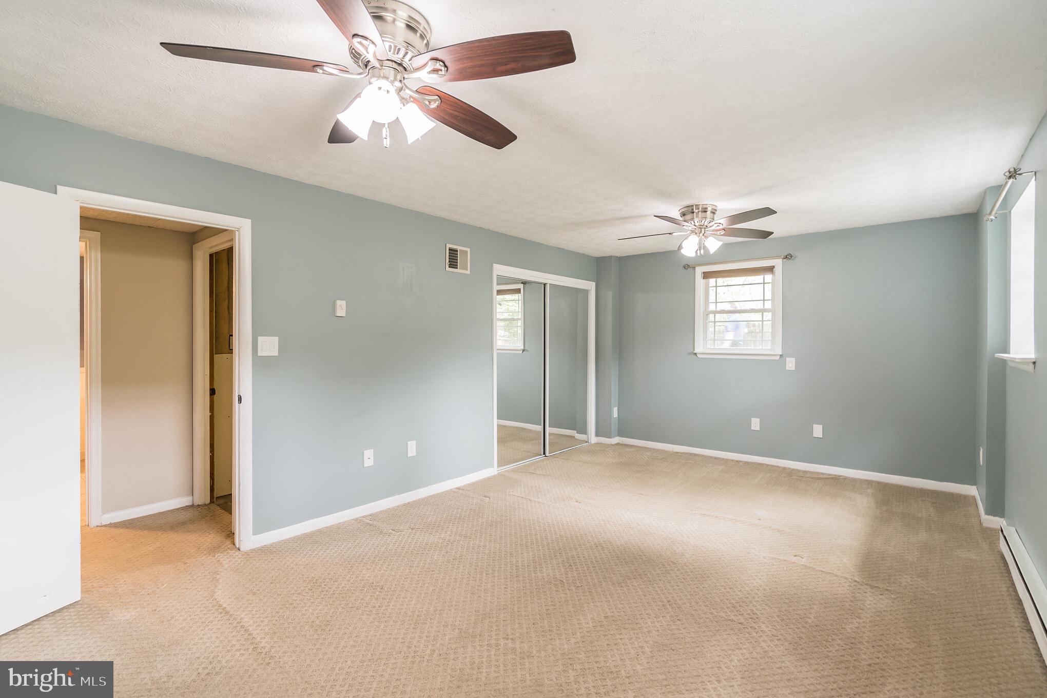 3130 Holland Cliffs Road Huntingtown, MD 20639 - Photo 19 of 33 Huge, light filled lower level bedroom
