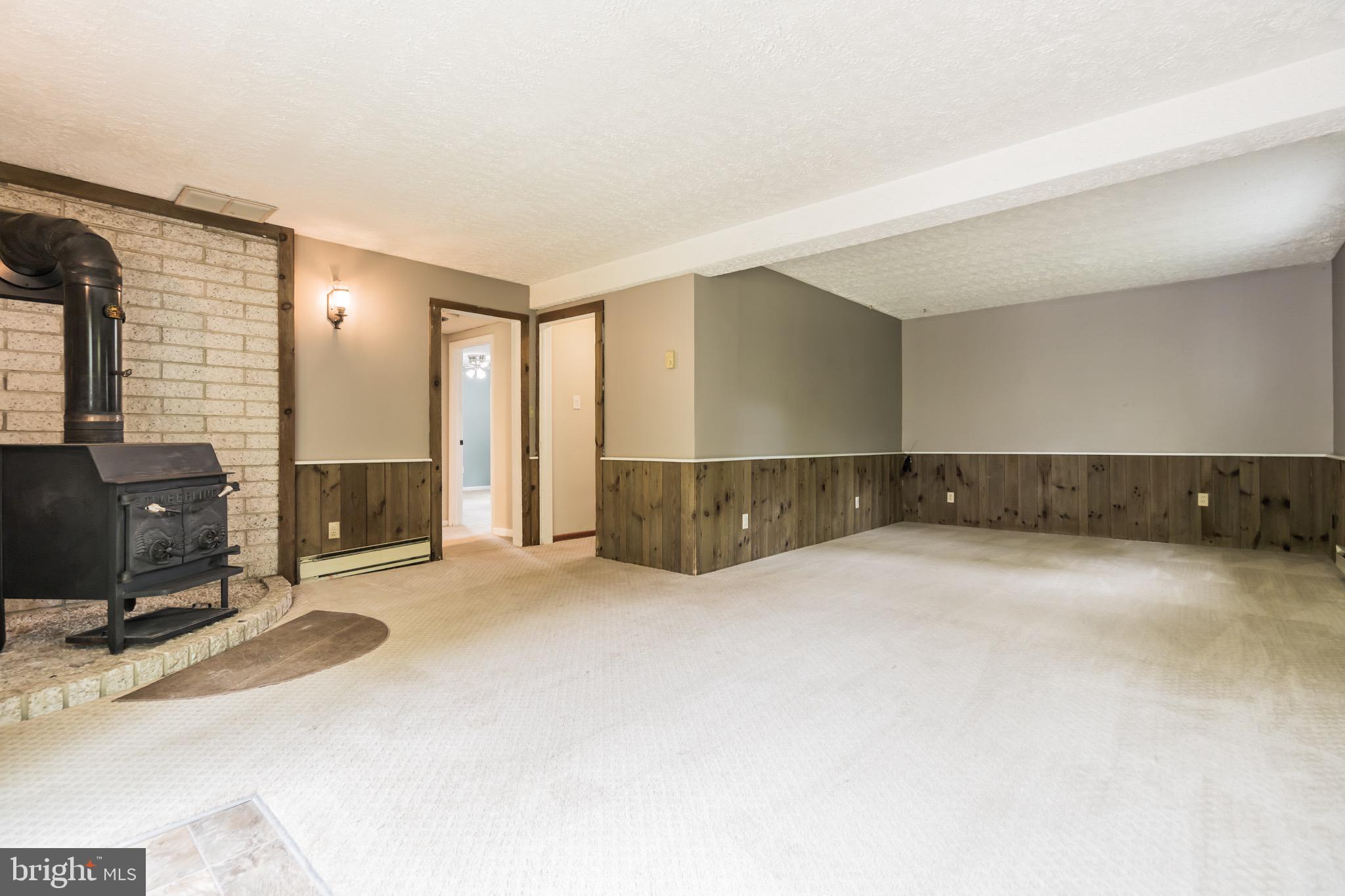 3130 Holland Cliffs Road Huntingtown, MD 20639 - Photo 21 of 33 Spacious lower level that walks out to the pool