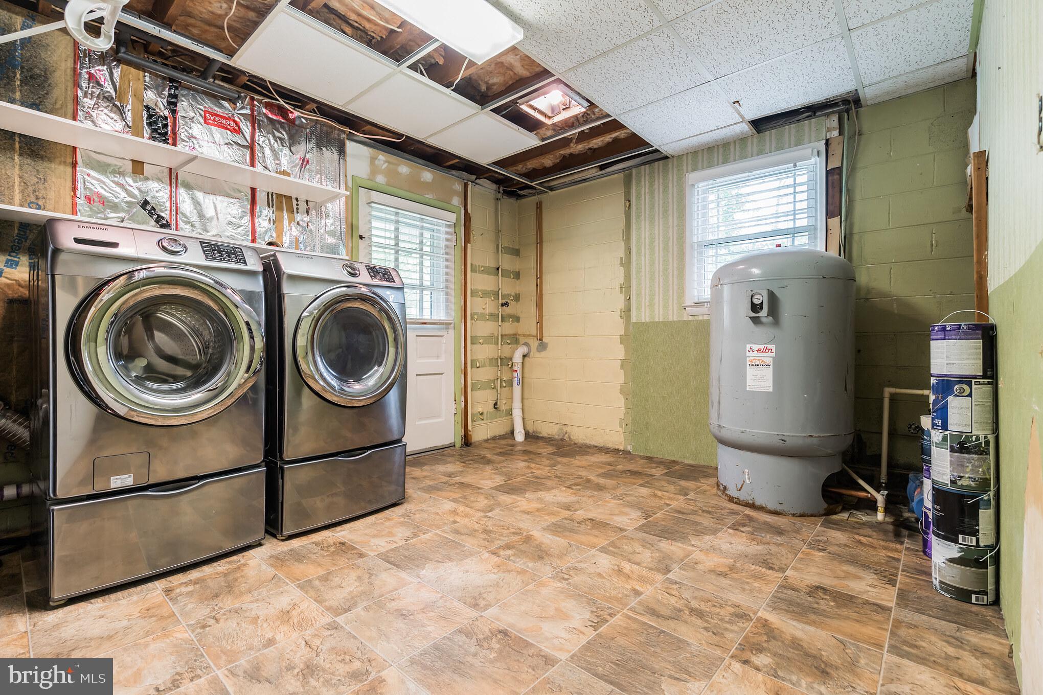 3130 Holland Cliffs Road Huntingtown, MD 20639 - Photo 24 of 33 This mudroom/laundry room is ready for your ideas!