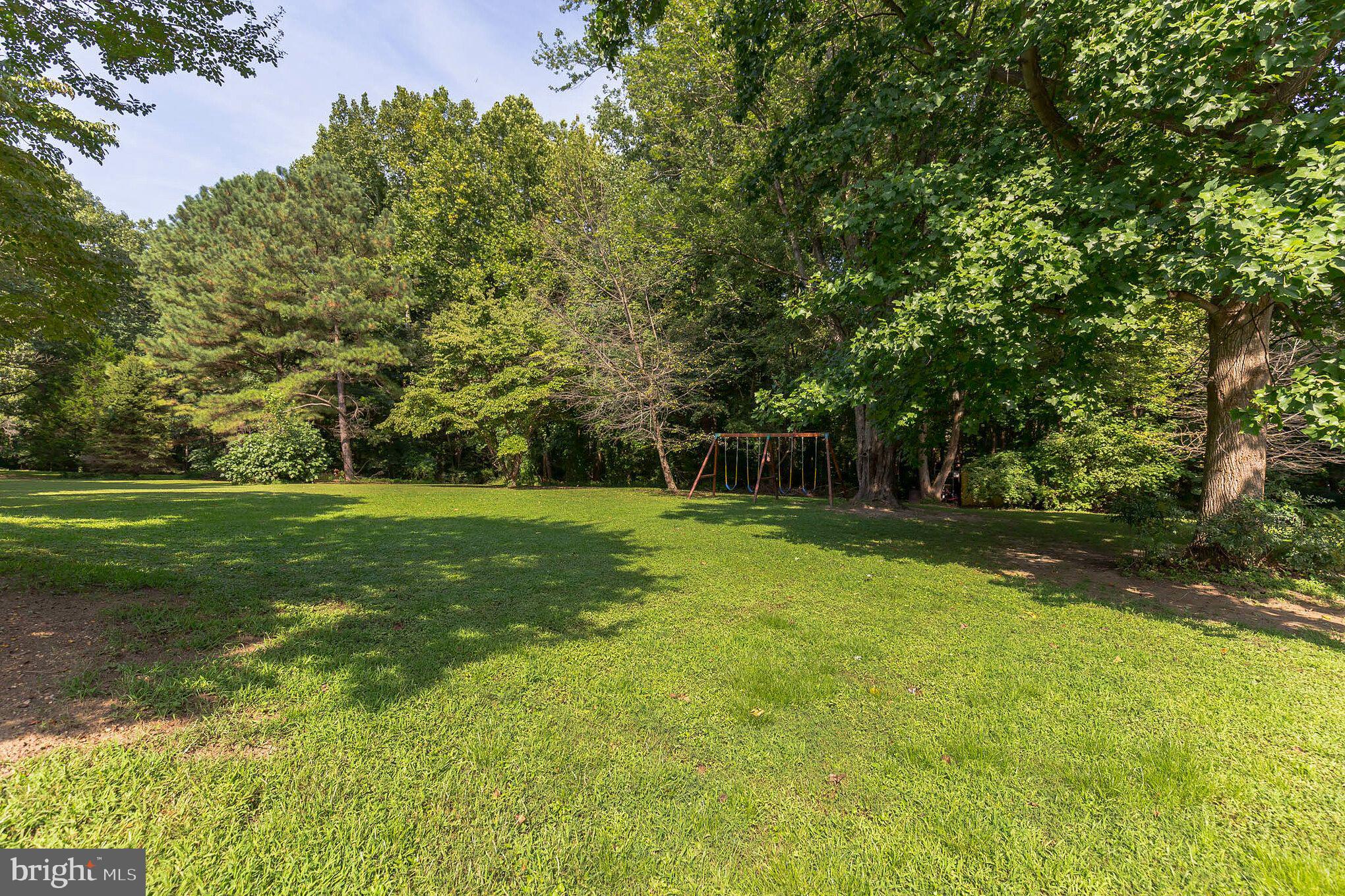 3130 Holland Cliffs Road Huntingtown, MD 20639 - Photo 28 of 33 Large yard behind the pool area