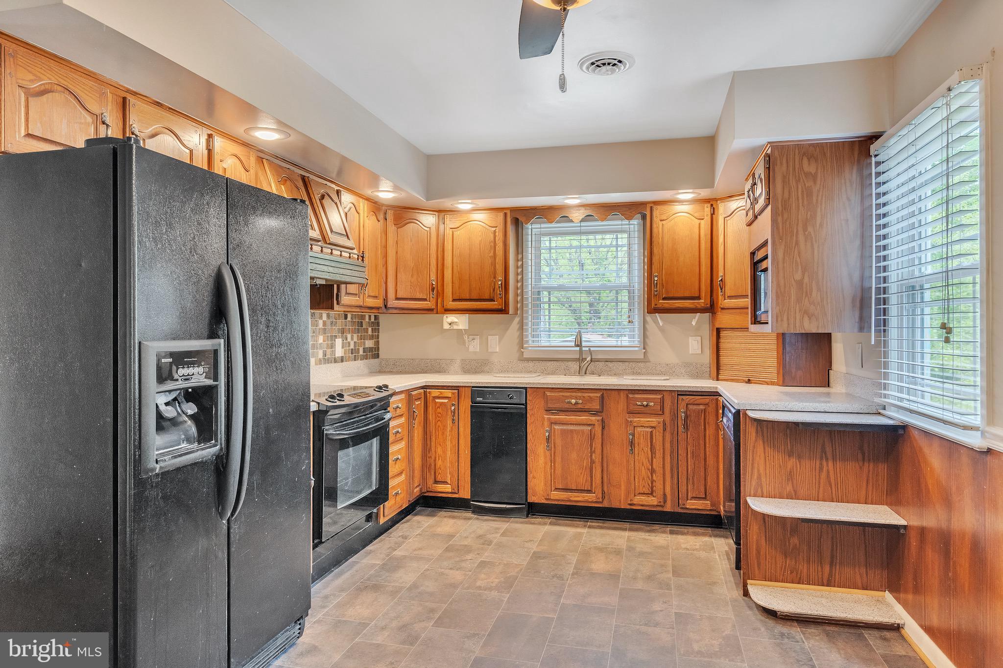 3130 Holland Cliffs Road Huntingtown, MD 20639 - Photo 7 of 33 Light filled Kitchen