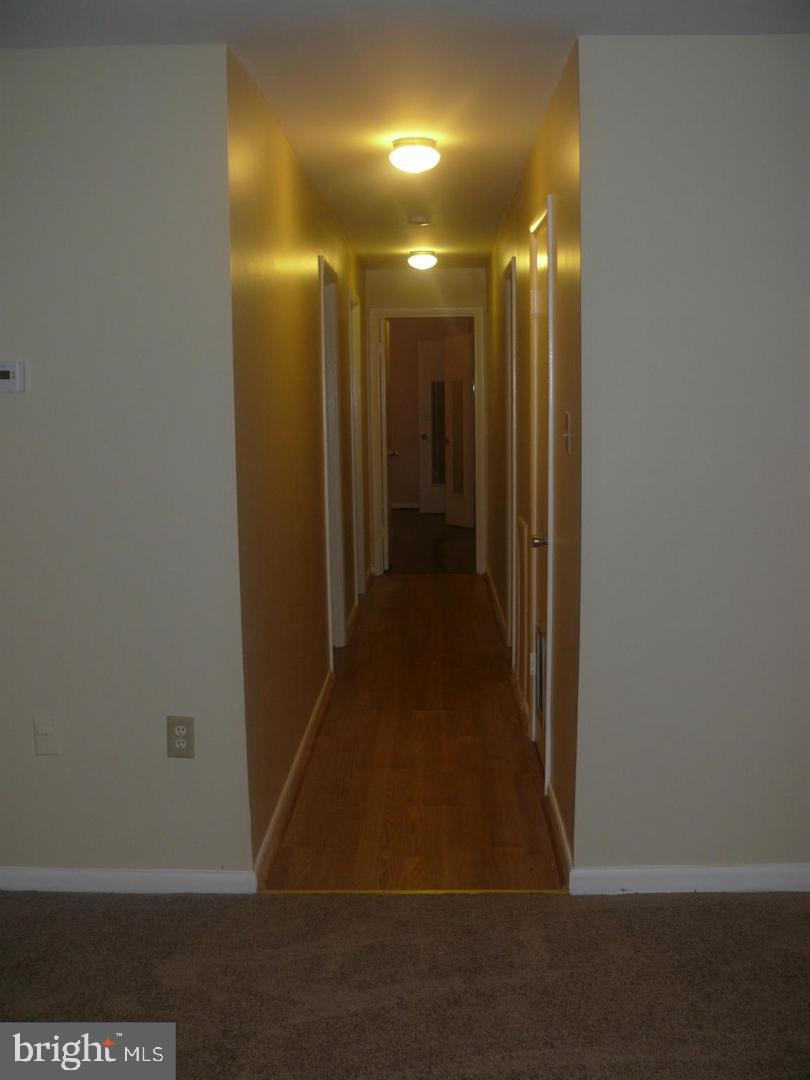 15712 Dorset Road, Unit T3 Laurel, MD 20707 - Photo 15 of 19 a view of hallway with shower
