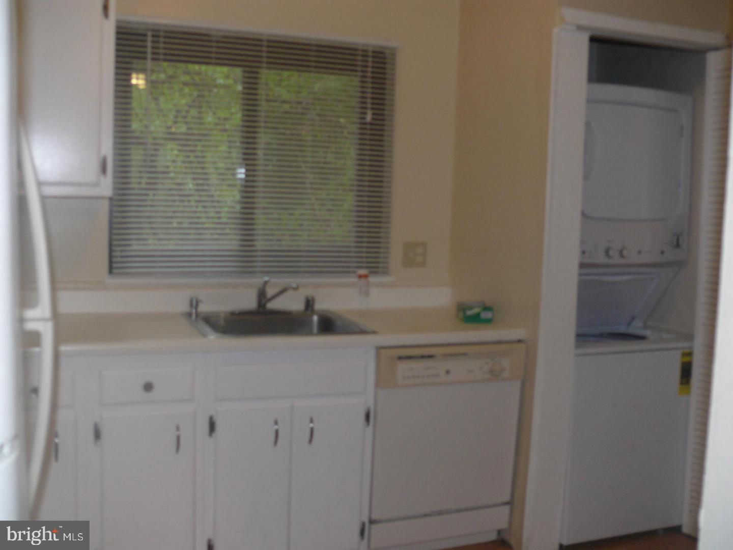 15712 Dorset Road, Unit T3 Laurel, MD 20707 - Photo 7 of 19 a bathroom with a sink and a mirror