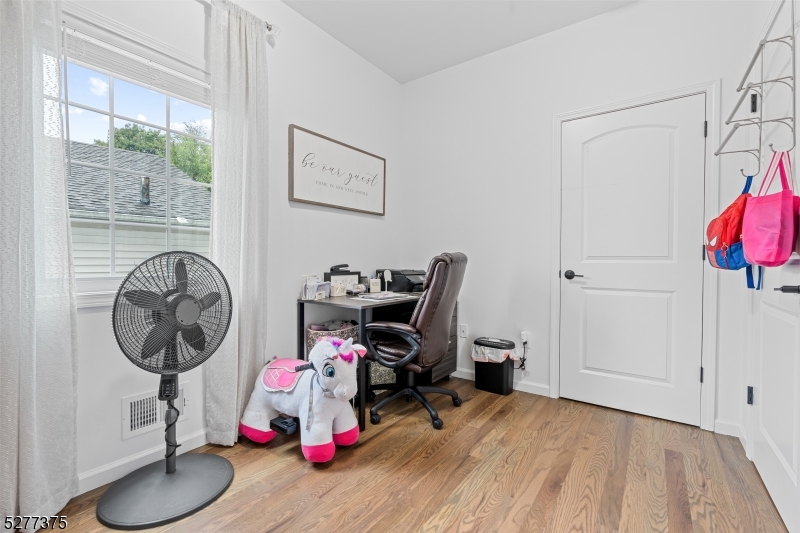 38 Center Street Belleville, NJ 07109 - Photo 16 of 22 a view of a room with gym equipment