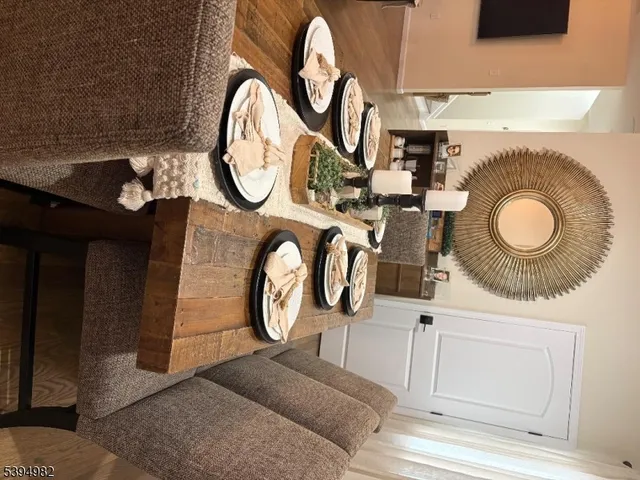 a kitchen with a dining table and chairs