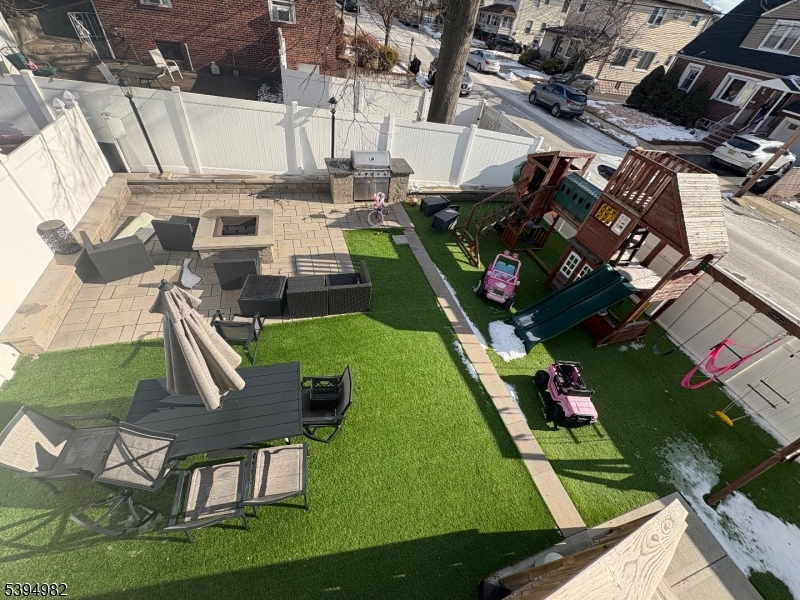 38 Center Street Belleville, NJ 07109 - Photo 19 of 22 an aerial view of a pool with a yard