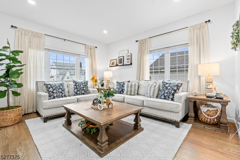38 Center Street Belleville, NJ 07109 - Photo 5 of 22 a living room with furniture and a large window