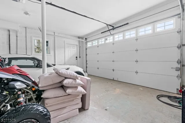 a children room with toys and a flat screen tv