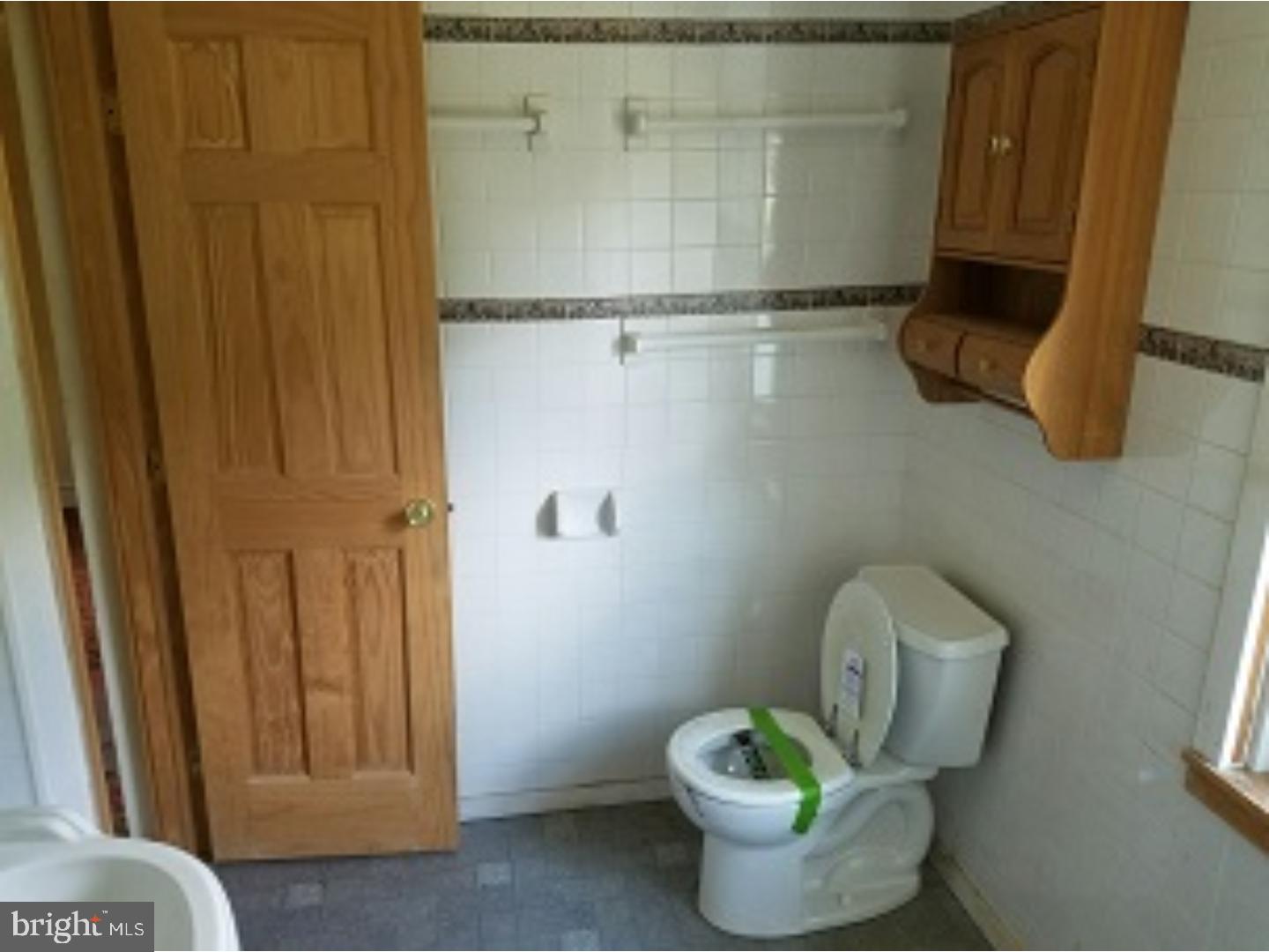 41 Limekiln Road Reading, PA 19606 - Photo 8 of 12 a bathroom with a toilet and a sink